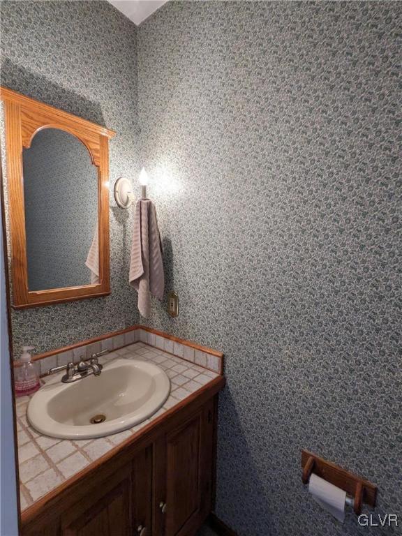 4422 Ammon Way Whitehall, PA 18052 - Photo 30 of 30 a bathroom with a sink and a mirror