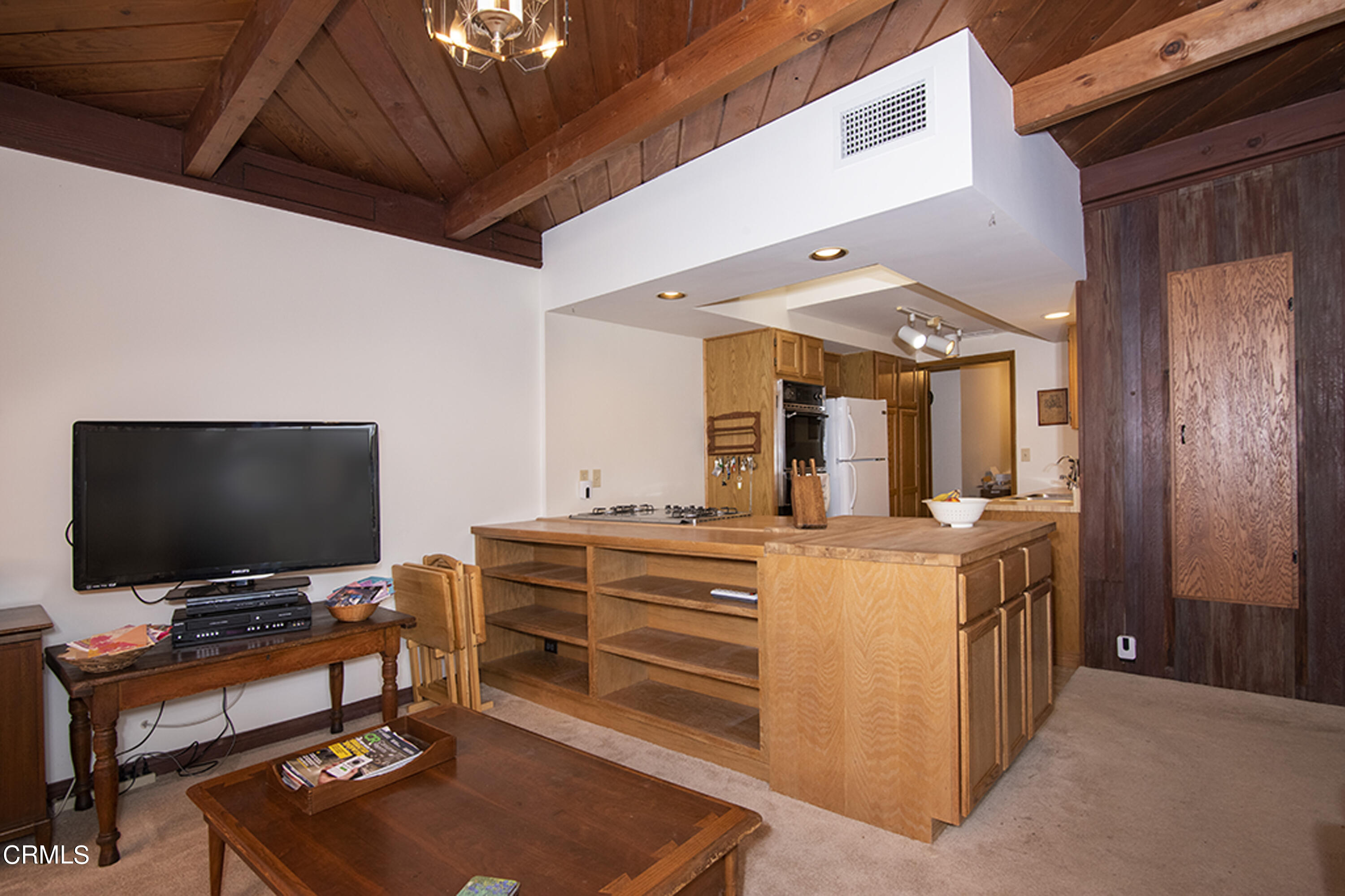 2888 Reposa Lane Altadena, CA 91001 - Photo 12 of 60 a room with furniture and flat screen tv