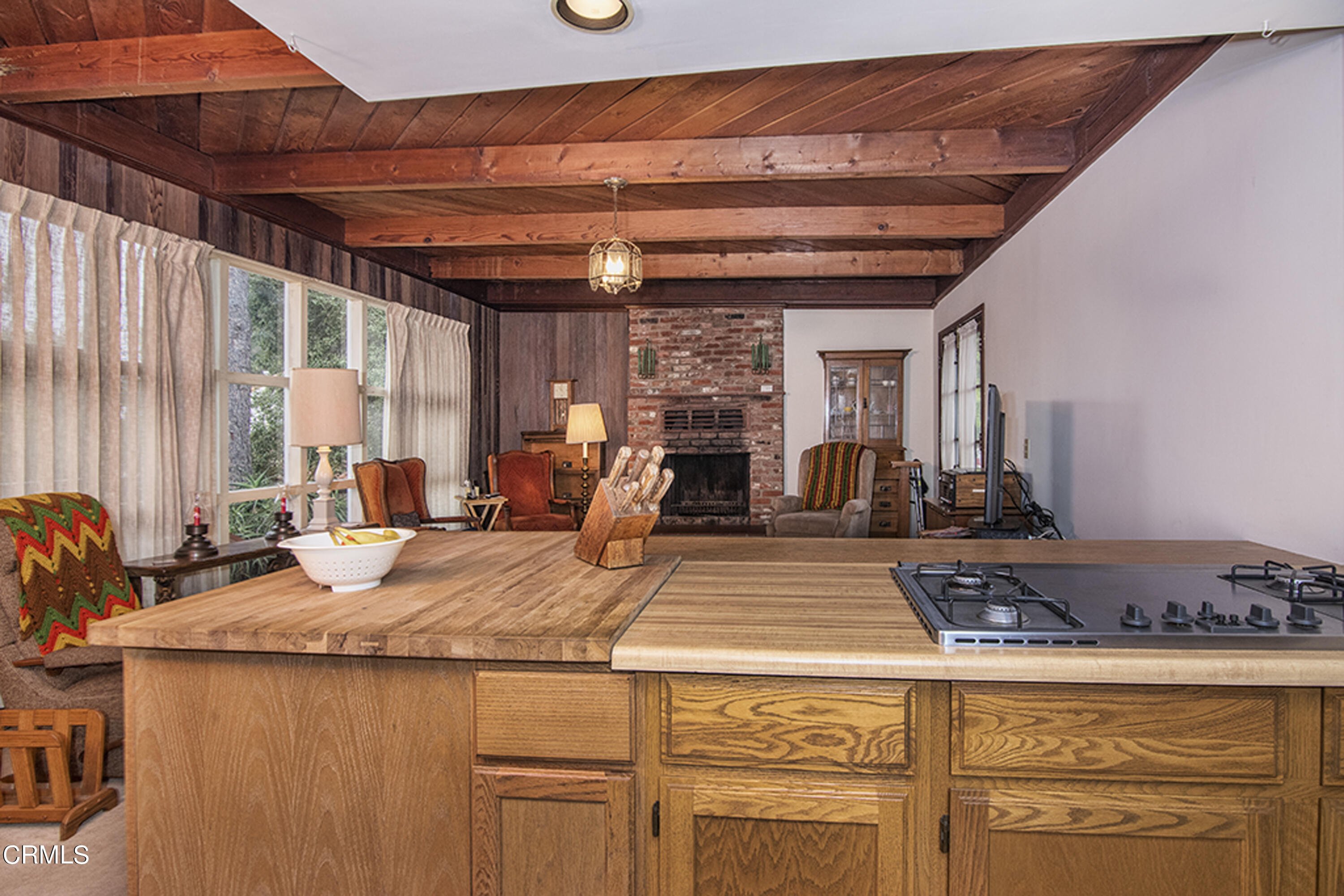 2888 Reposa Lane Altadena, CA 91001 - Photo 15 of 60 a view of a kitchen with granite countertop a sink and a counter top space