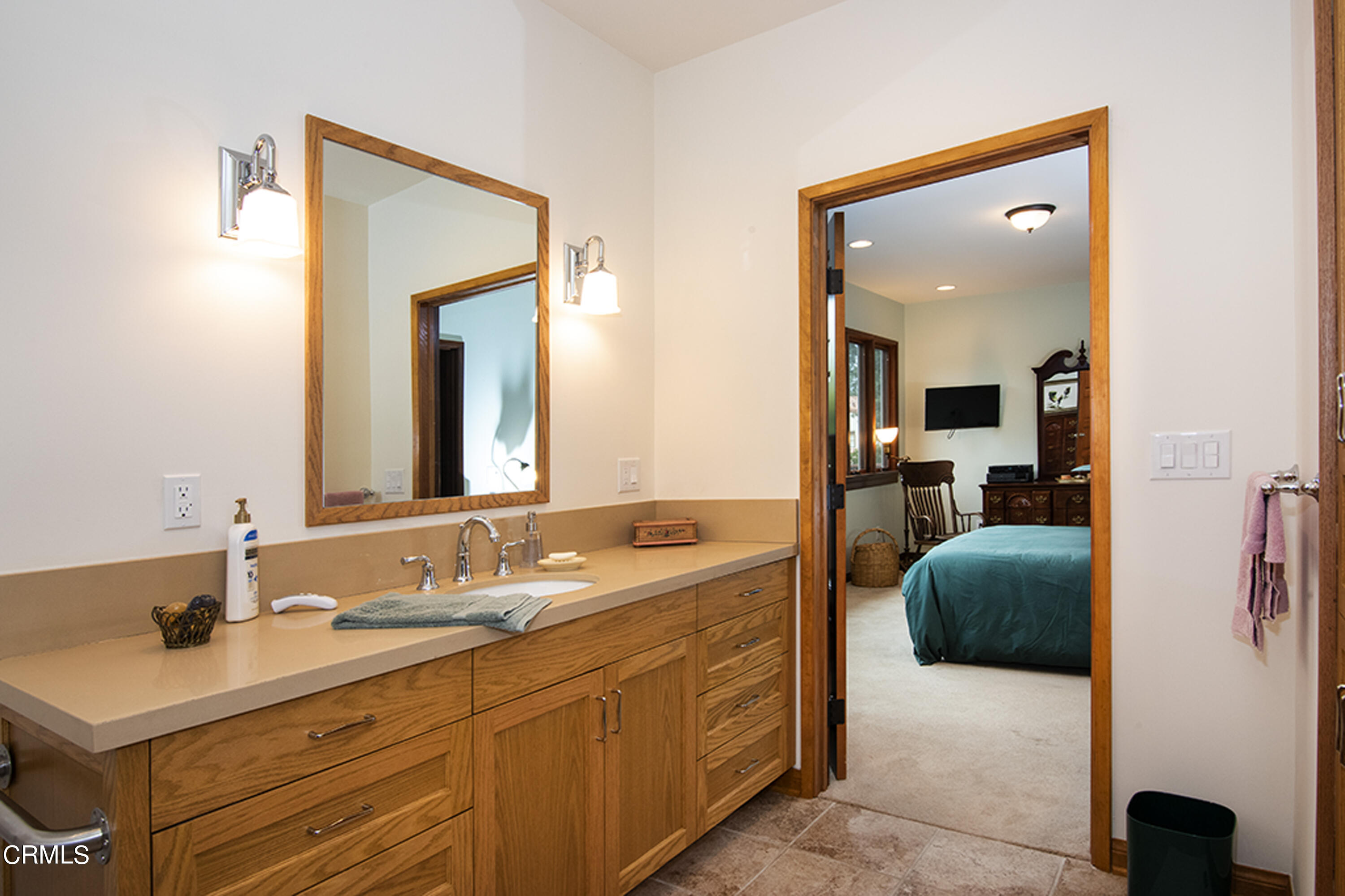 2888 Reposa Lane Altadena, CA 91001 - Photo 17 of 60 a en suite bathroom with a sink and a mirror