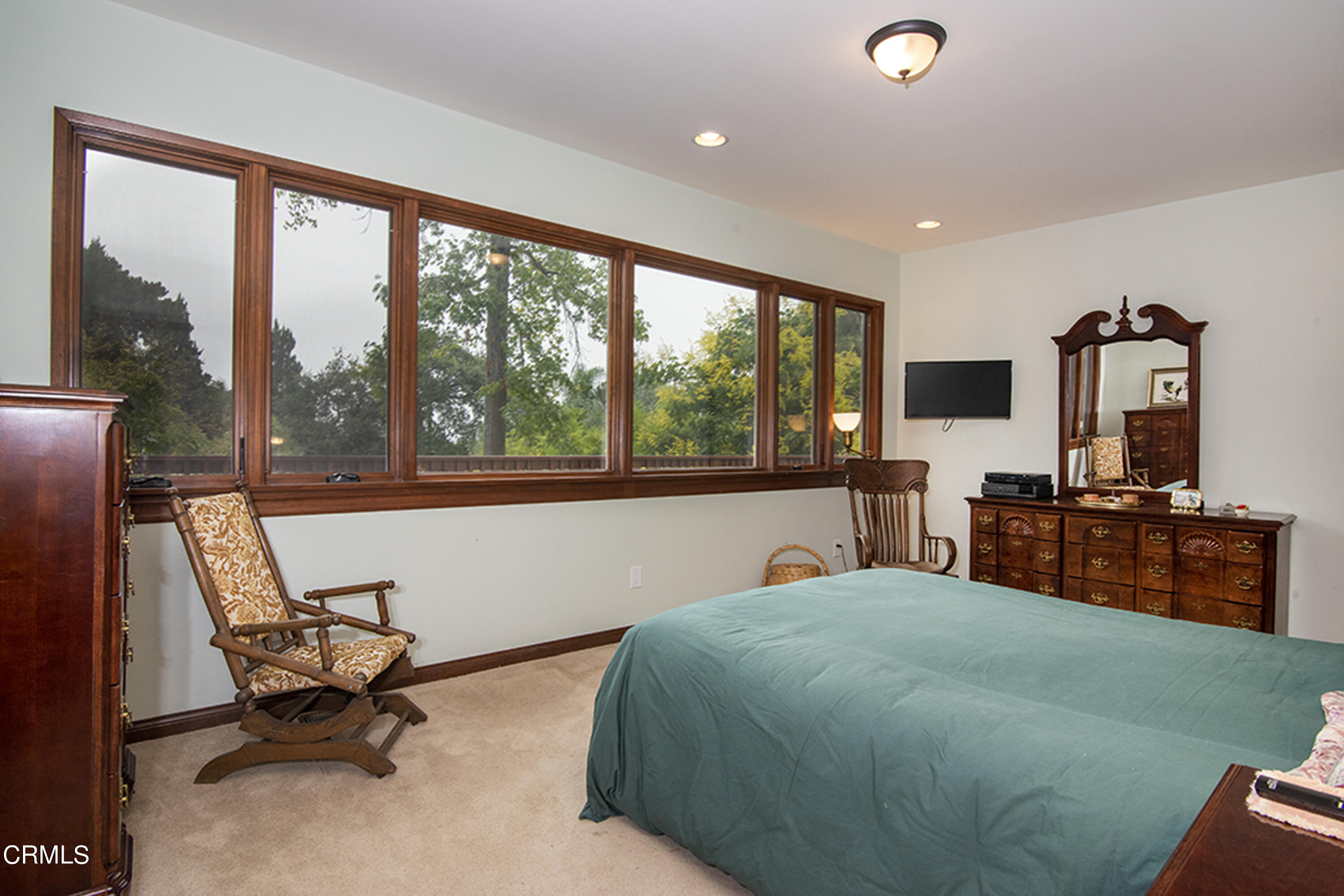 2888 Reposa Lane Altadena, CA 91001 - Photo 26 of 60 a living room with furniture and large windows