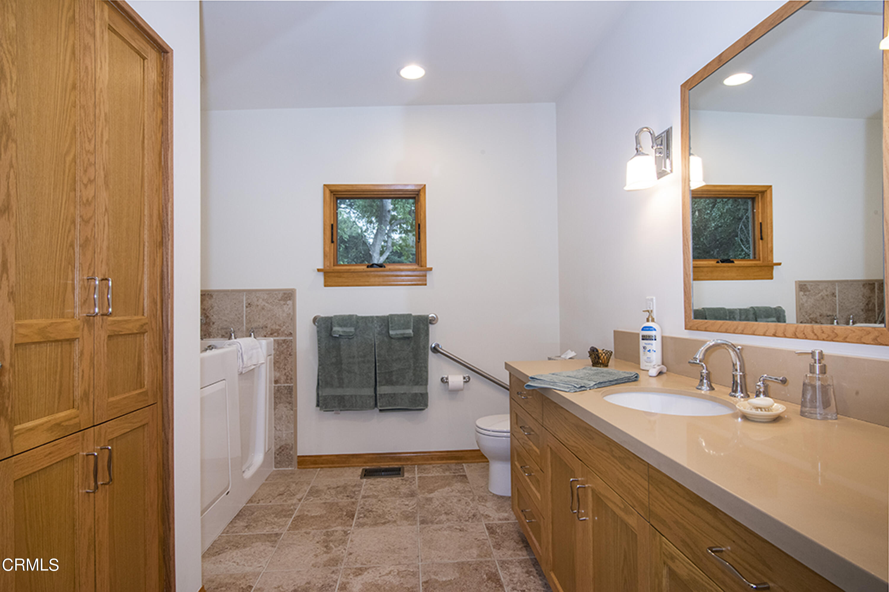 2888 Reposa Lane Altadena, CA 91001 - Photo 28 of 60 a bathroom with a sink a vanity and a mirror