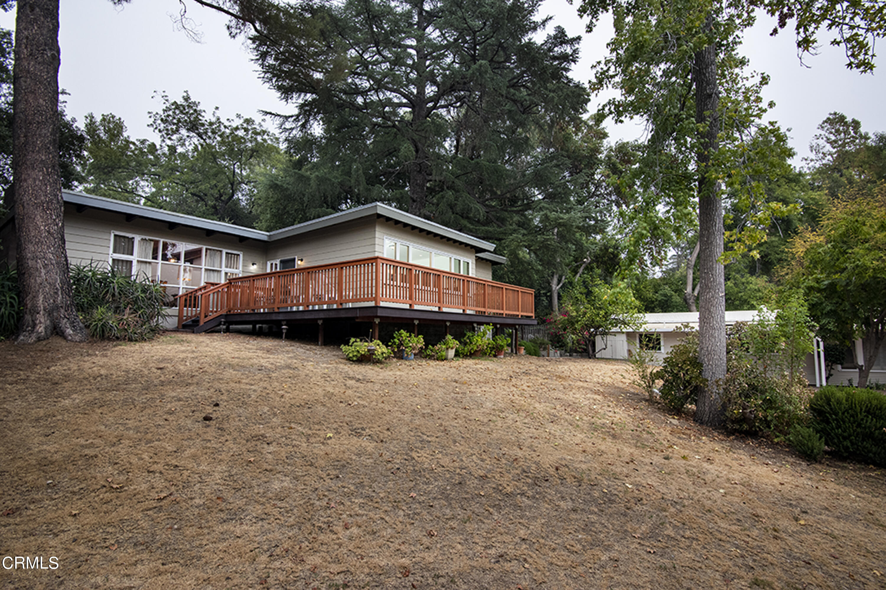 2888 Reposa Lane Altadena, CA 91001 - Photo 33 of 60 a front view of a house with a yard and trees