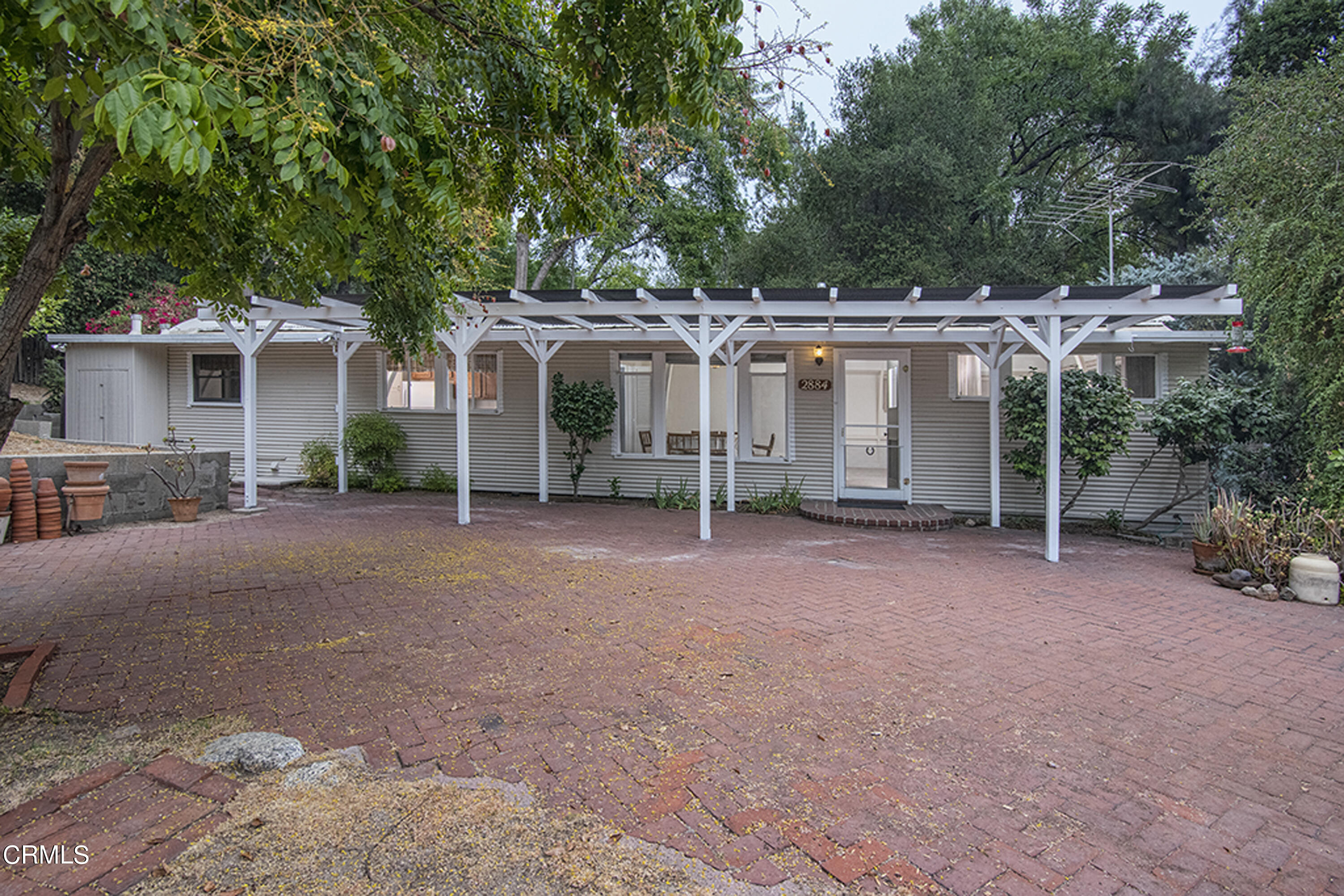 2888 Reposa Lane Altadena, CA 91001 - Photo 52 of 60 a view of a house with a yard and large trees
