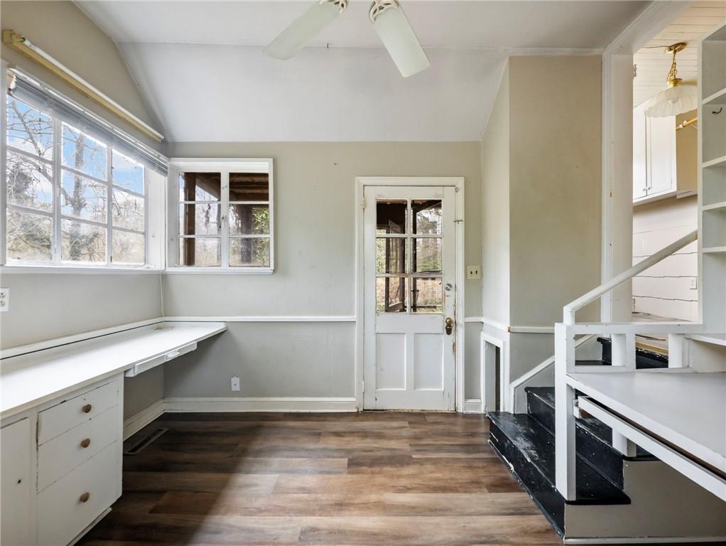 1093 Enota Avenue Northeast Gainesville, GA 30501 - Photo 17 of 47 a view of a kitchen with a sink and dishwasher wooden floor