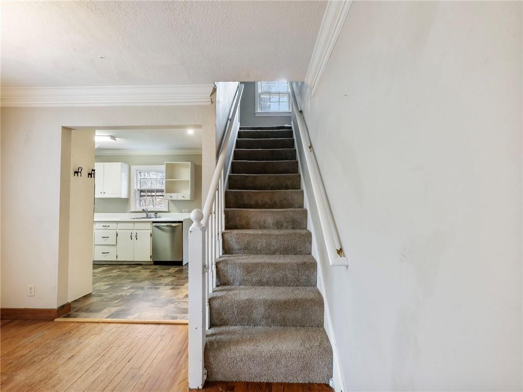 1093 Enota Avenue Northeast Gainesville, GA 30501 - Photo 26 of 47 a view of entryway and hall with wooden floor