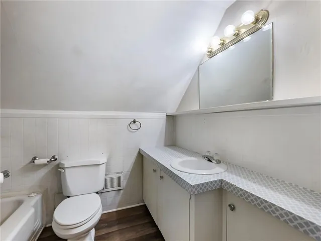 front view of a house with a dry yard