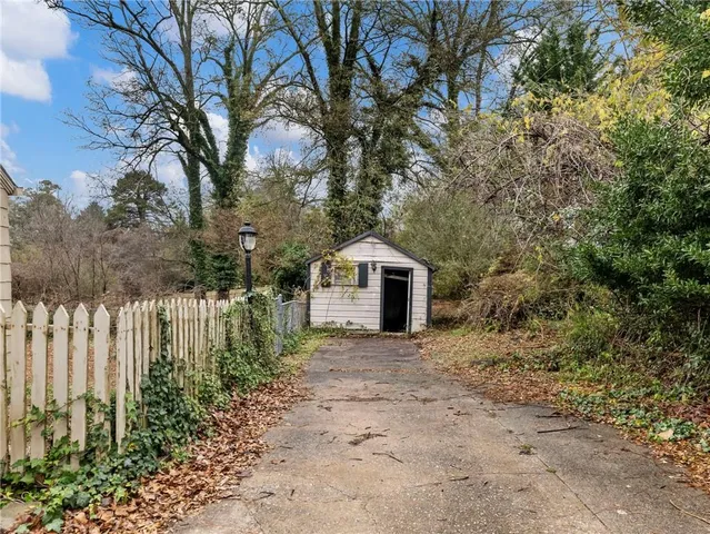 a view of a backyard of the house
