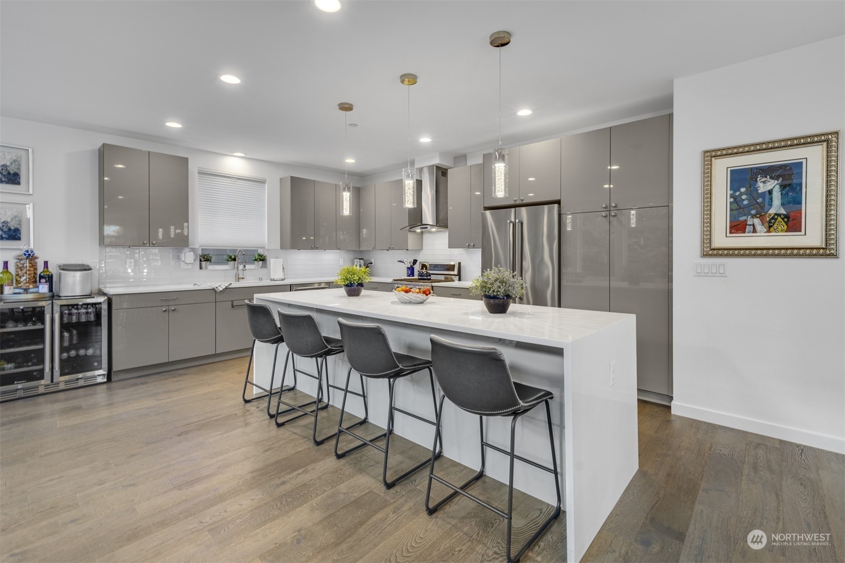 521 Southwest 3rd Place Renton, WA 98057 - Photo 17 of 32 a kitchen with a table and chairs in it