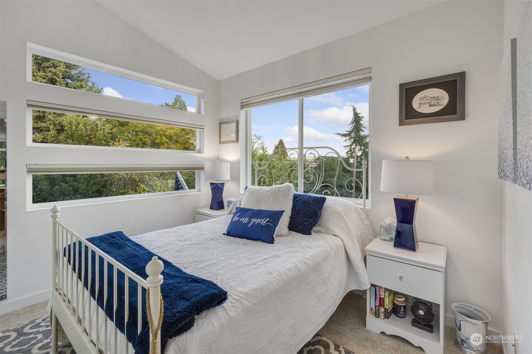 521 Southwest 3rd Place Renton, WA 98057 - Photo 21 of 32 a bedroom with a bed and a window