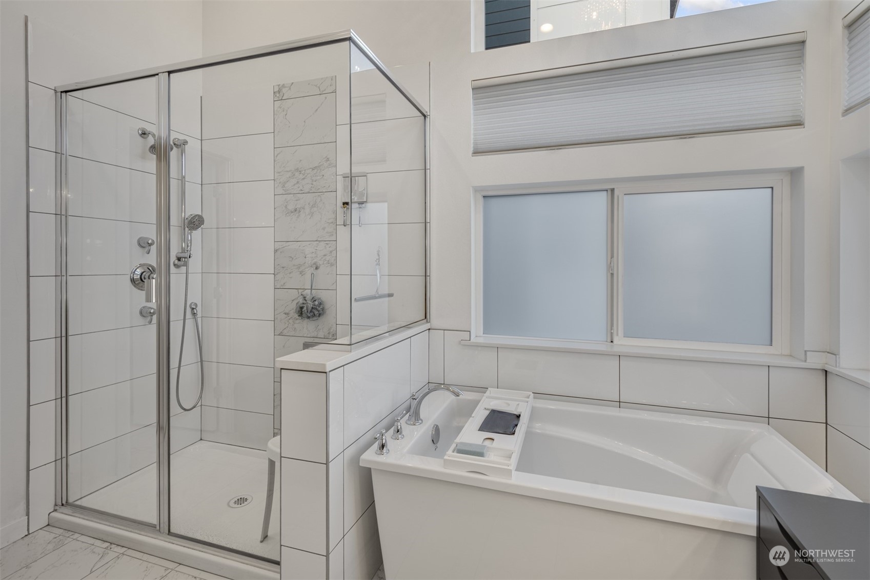 521 Southwest 3rd Place Renton, WA 98057 - Photo 25 of 32 a bathroom with a bathtub and a shower