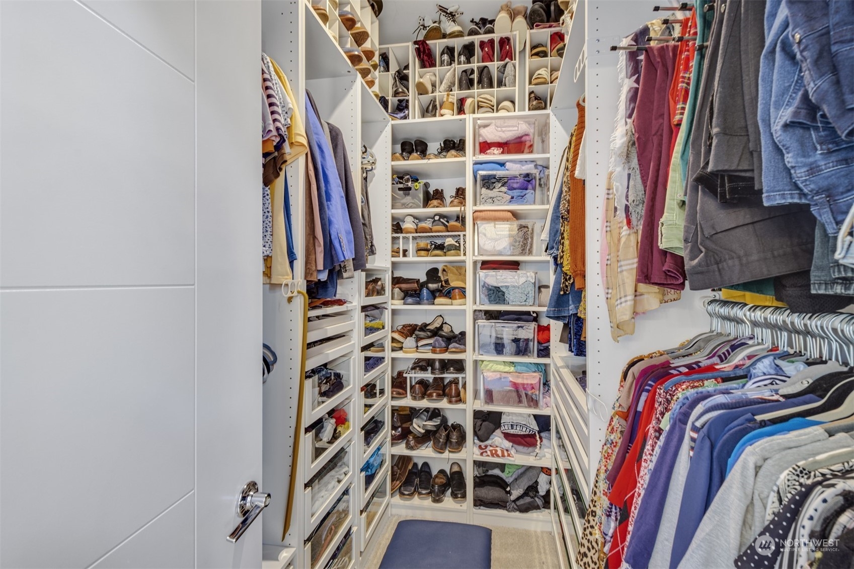 521 Southwest 3rd Place Renton, WA 98057 - Photo 26 of 32 a view of walk in closet with clothes and shoes