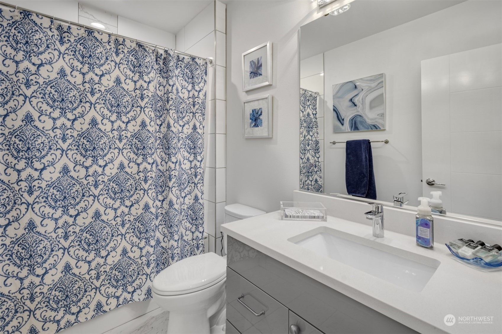 521 Southwest 3rd Place Renton, WA 98057 - Photo 29 of 32 a bathroom with a sink toilet and shower