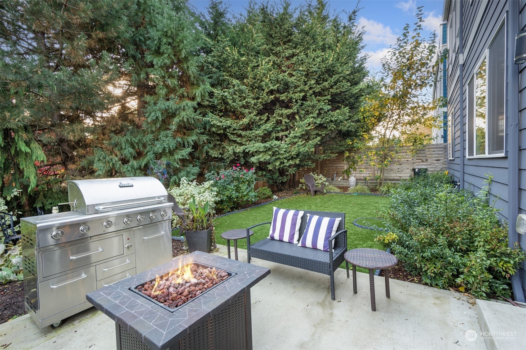 521 Southwest 3rd Place Renton, WA 98057 - Photo 30 of 32 a outdoor living space with furniture and a fireplace
