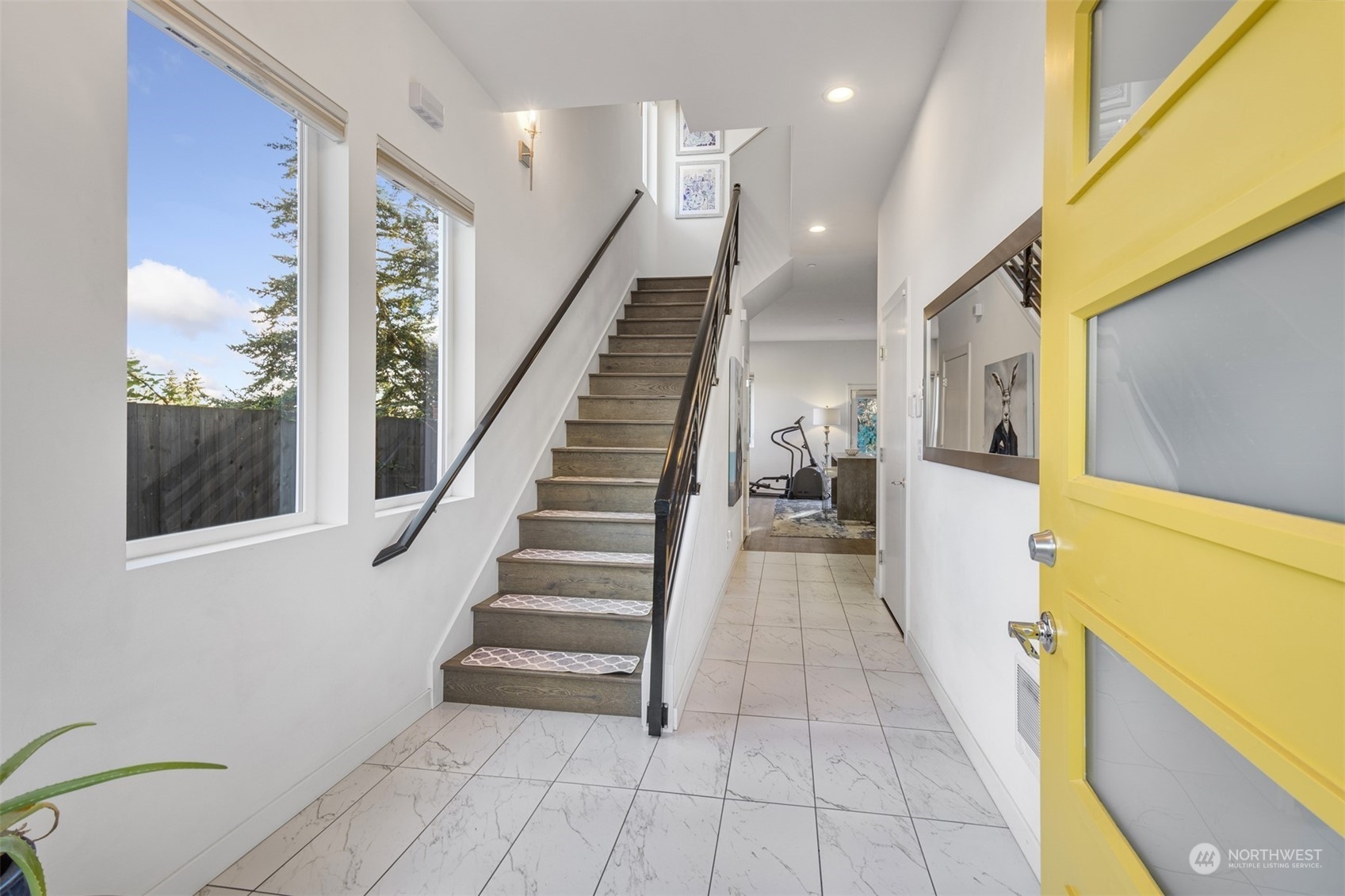 521 Southwest 3rd Place Renton, WA 98057 - Photo 3 of 32 a view of entryway and hall with wooden floor