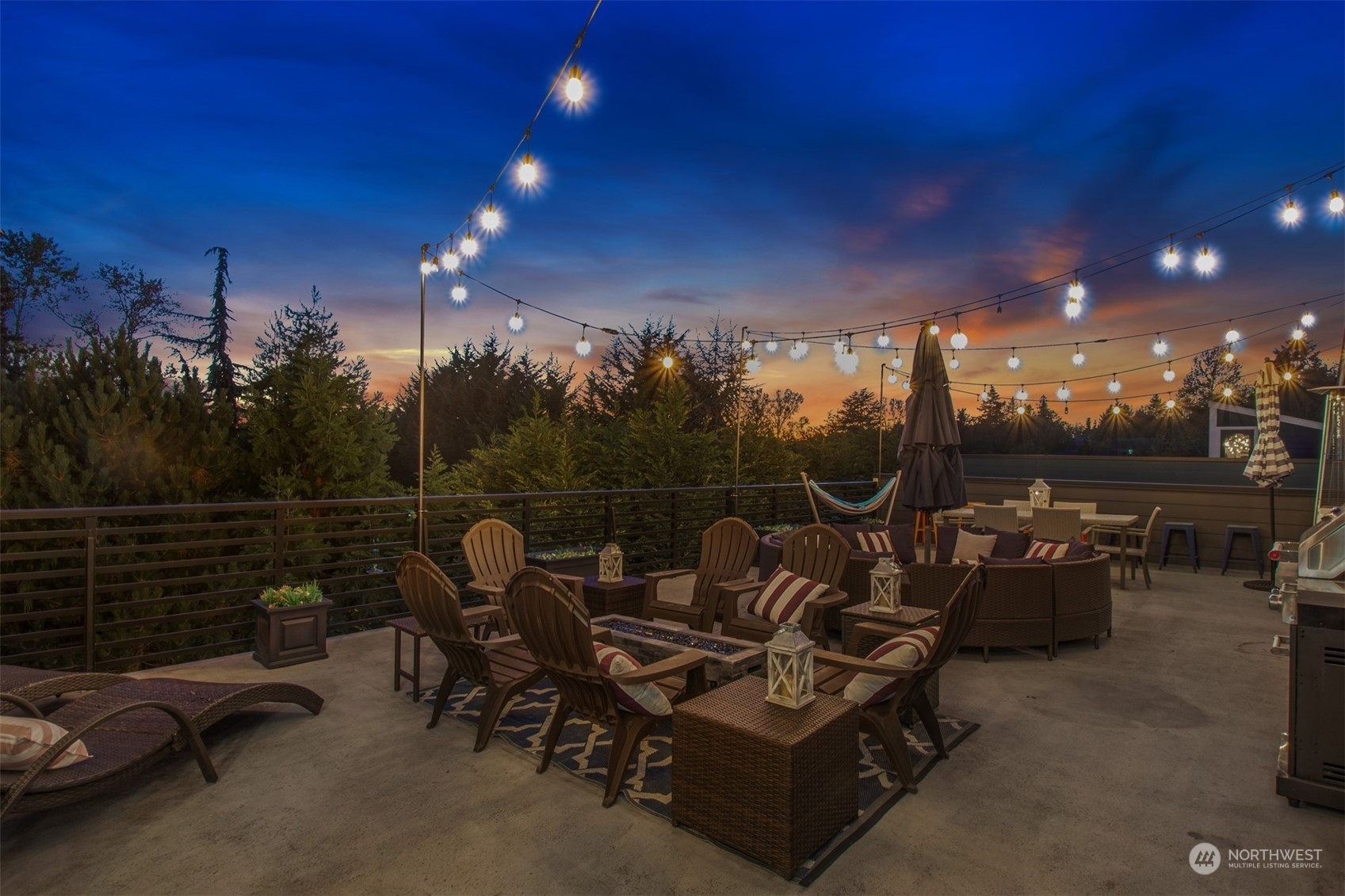 521 Southwest 3rd Place Renton, WA 98057 - Photo 31 of 32 a roof deck with table and chairs