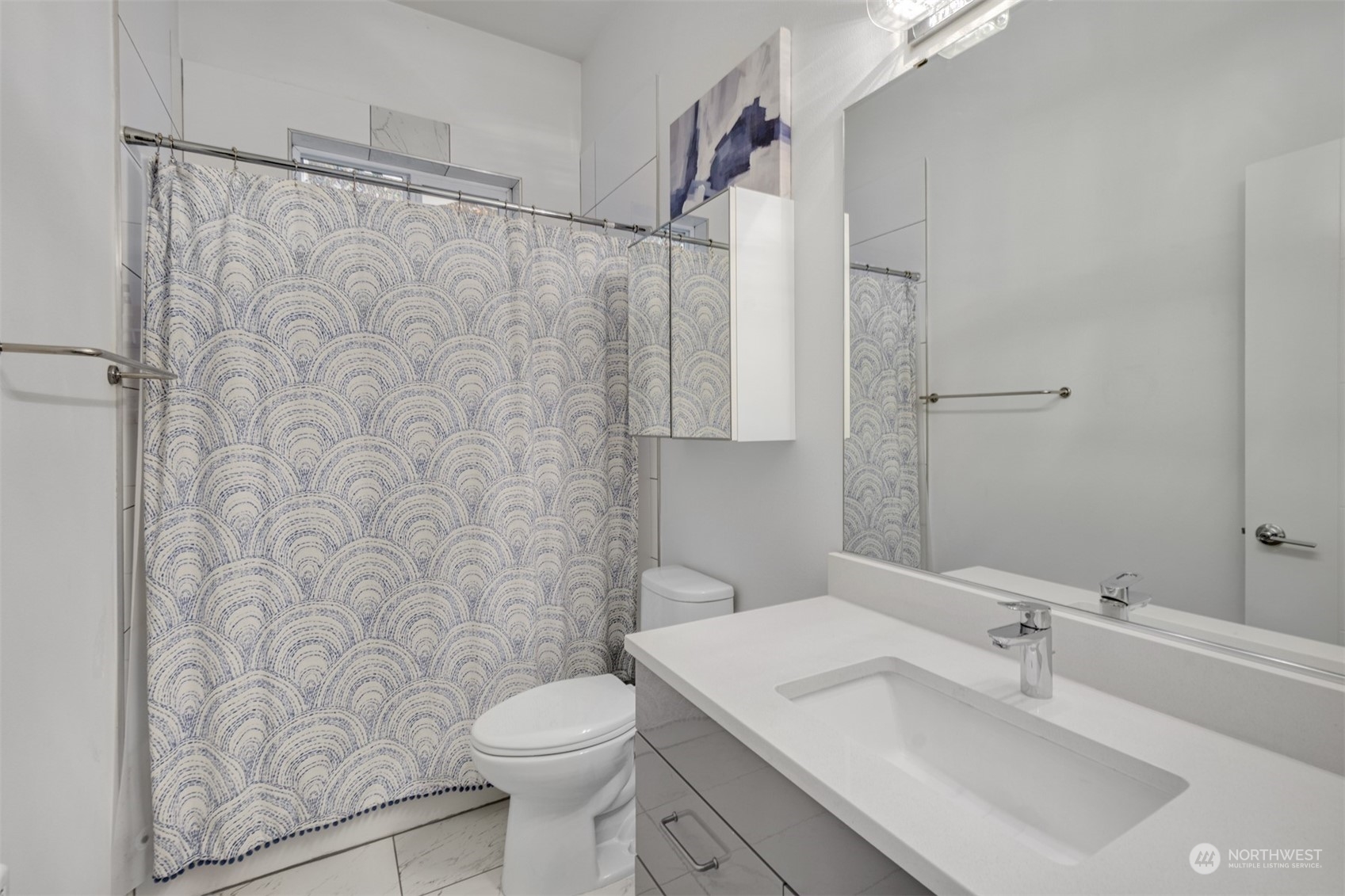 521 Southwest 3rd Place Renton, WA 98057 - Photo 10 of 32 a bathroom with a sink toilet and shower