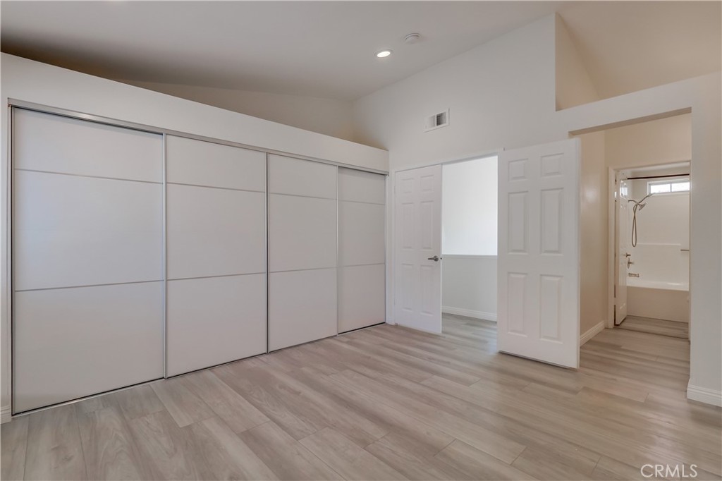 1876 Forest Drive Azusa, CA 91702 - Photo 12 of 24 a view of an empty room with wooden floor