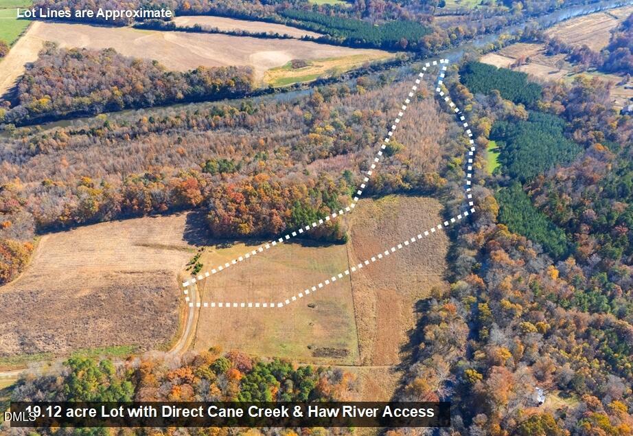 6061 River Run Trail Graham, NC 27253 - Photo 9 of 71 a view of a lake