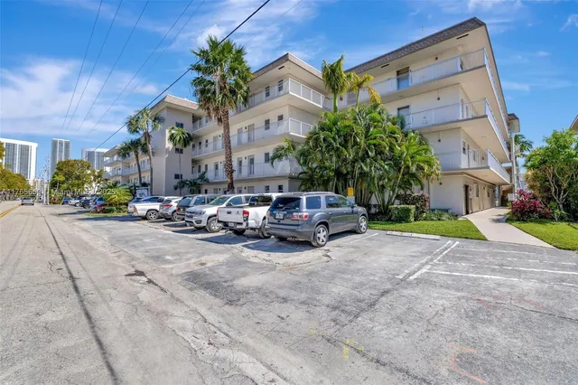 a view of car parked in front of building