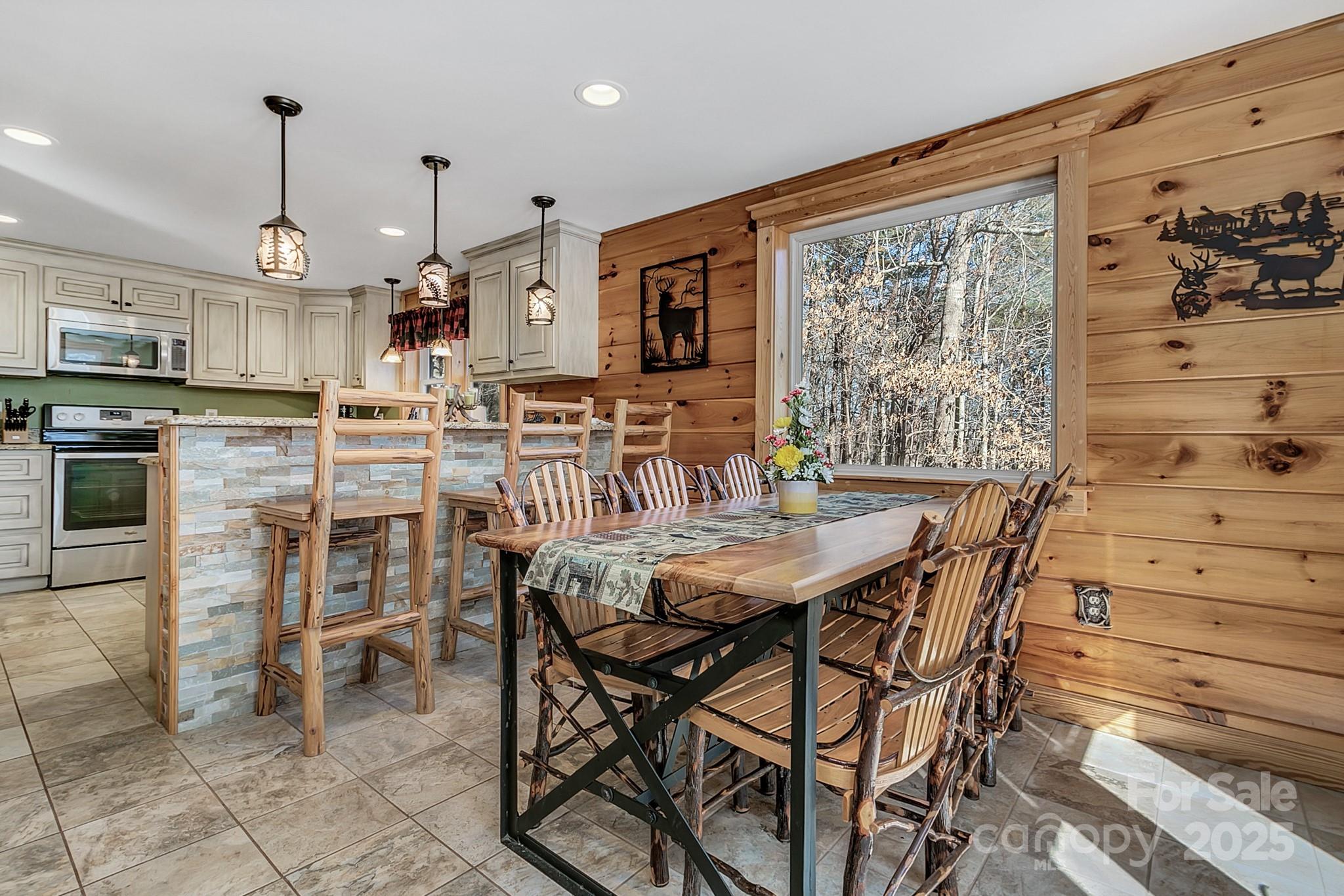 120 Sweetbriar Road North Lake Lure, NC 28746 - Photo 21 of 45 a view of a dining room with furniture