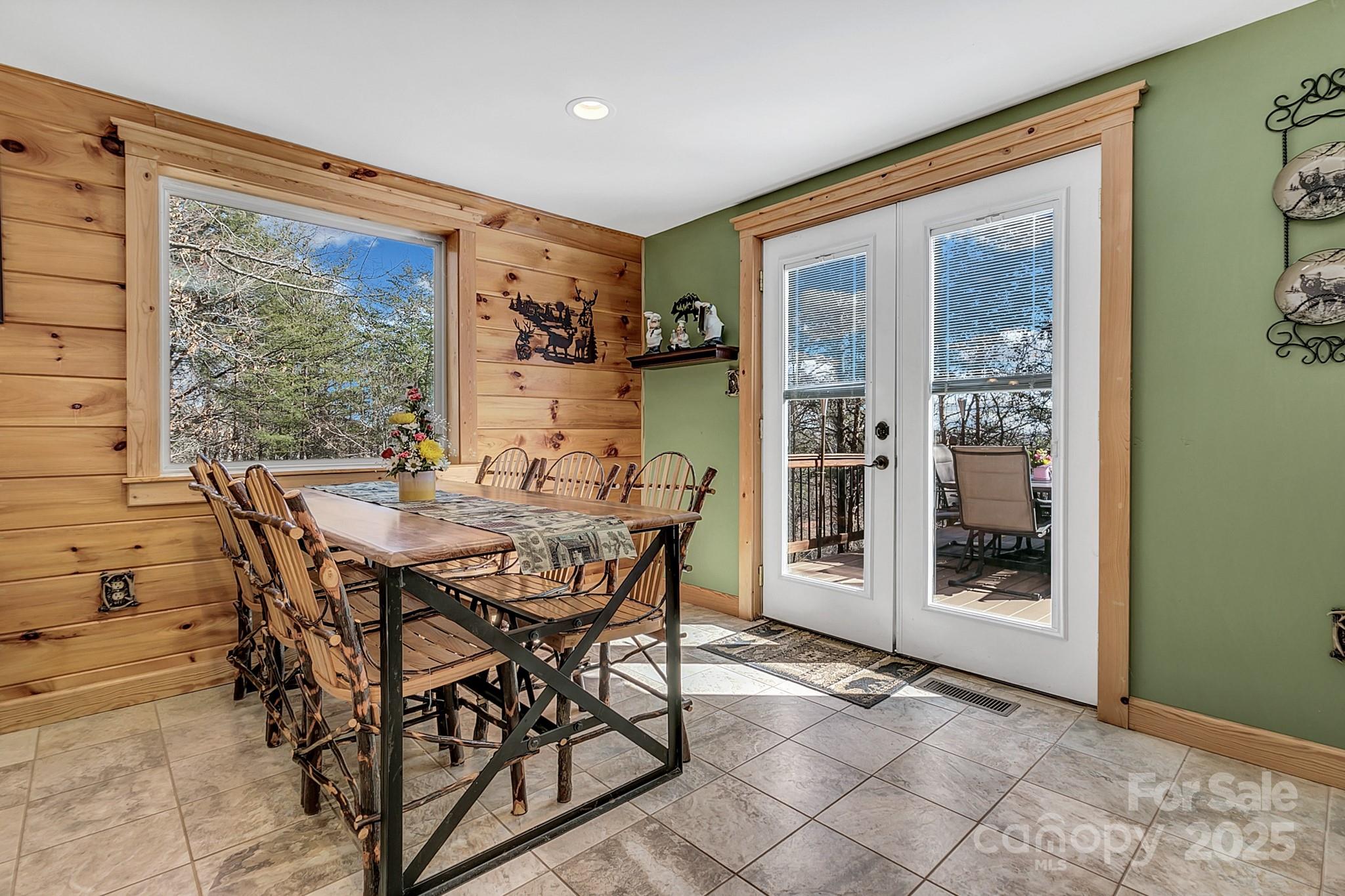 120 Sweetbriar Road North Lake Lure, NC 28746 - Photo 22 of 45 a view of a dining room with furniture window and outside view