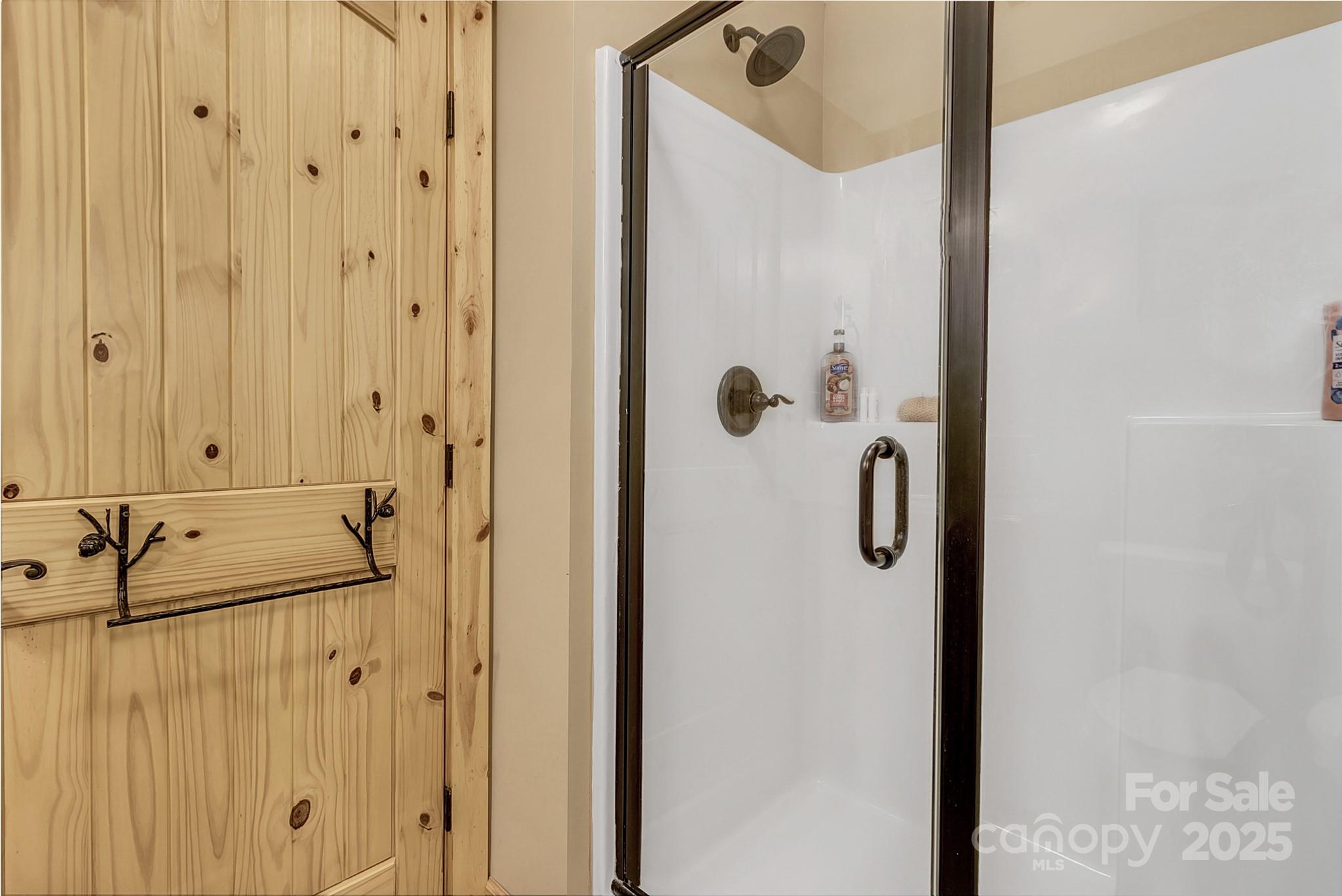 120 Sweetbriar Road North Lake Lure, NC 28746 - Photo 31 of 45 a bathroom with a tub and shower