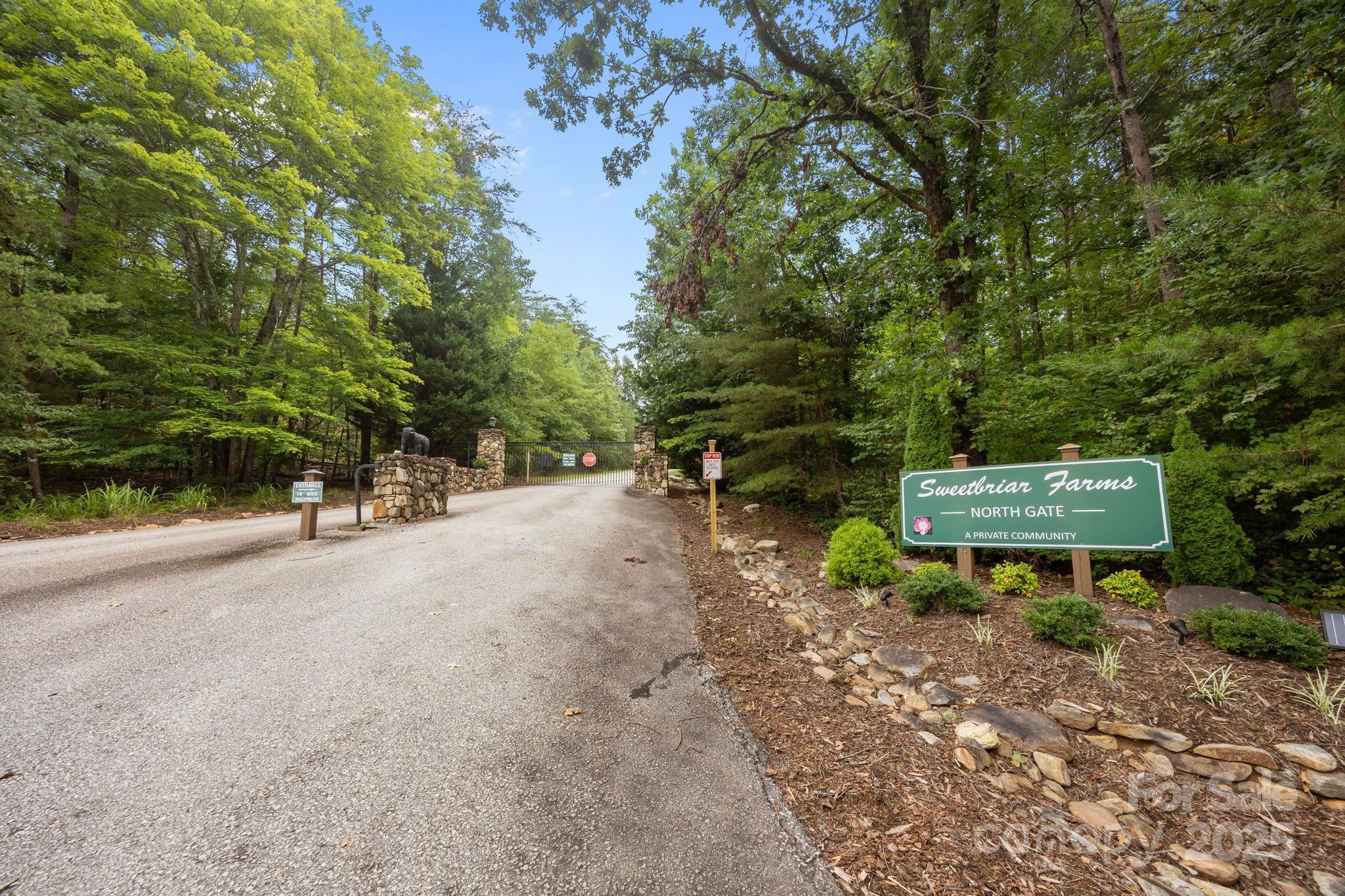 120 Sweetbriar Road North Lake Lure, NC 28746 - Photo 40 of 45 a view of a bench in a backyard