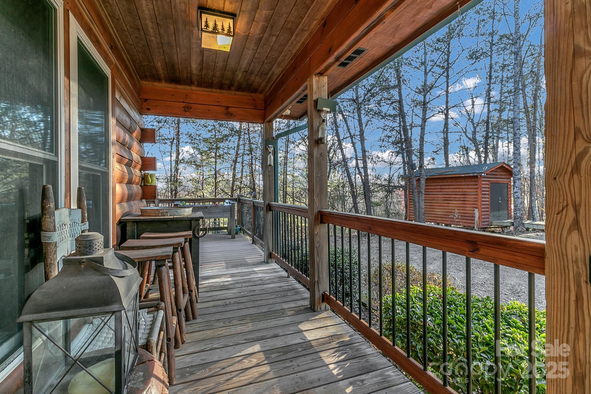 120 Sweetbriar Road North Lake Lure, NC 28746 - Photo 4 of 45 a view of a balcony with chairs