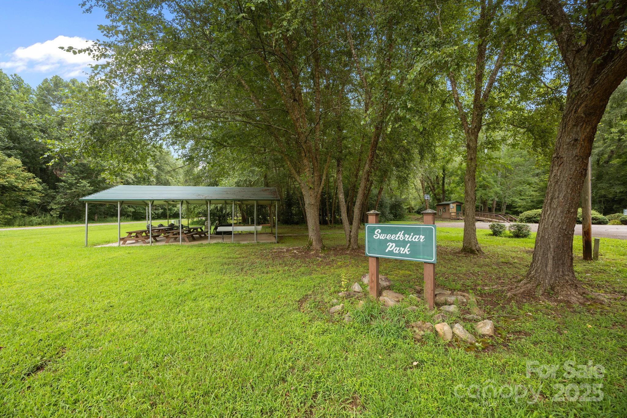 120 Sweetbriar Road North Lake Lure, NC 28746 - Photo 42 of 45 a garden view with a seating space