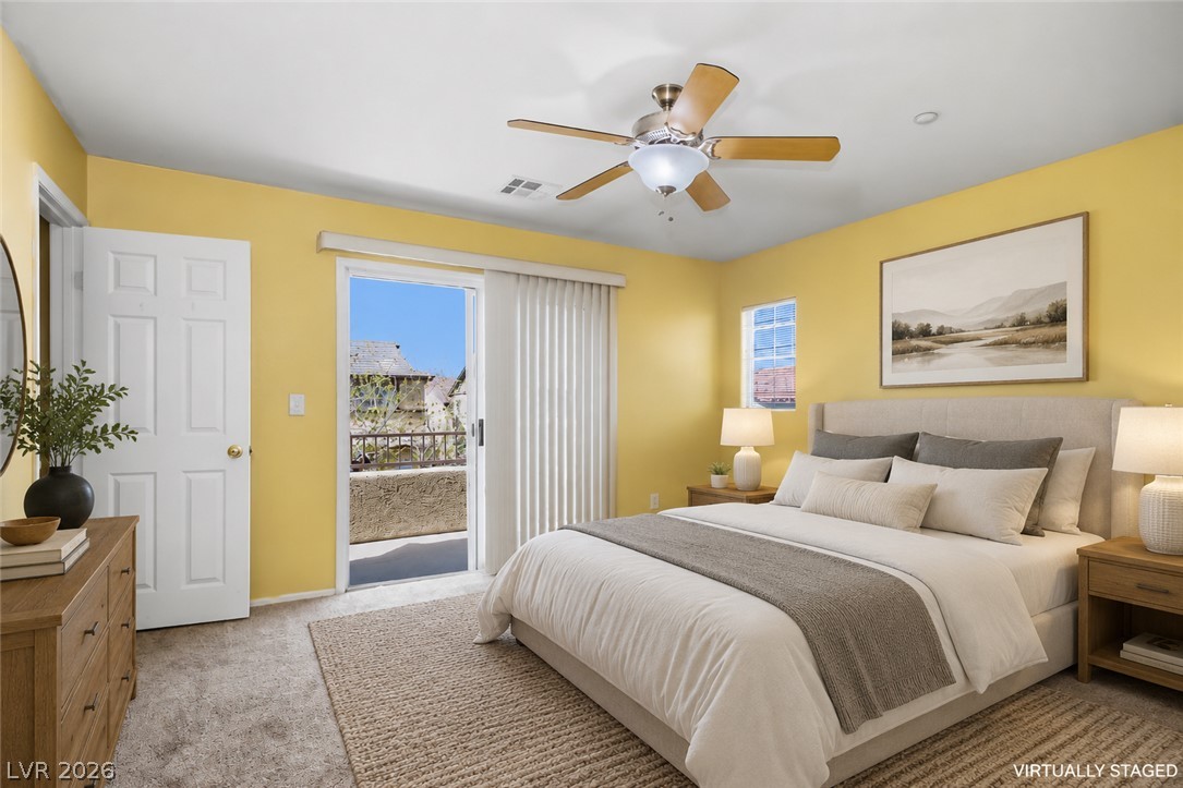 1172 Gecko Road Henderson, NV 89002 - Photo 10 of 30 Primary Bedroom has a beautiful patio with mountain views. Virtually staged to showcase the potential of this home!