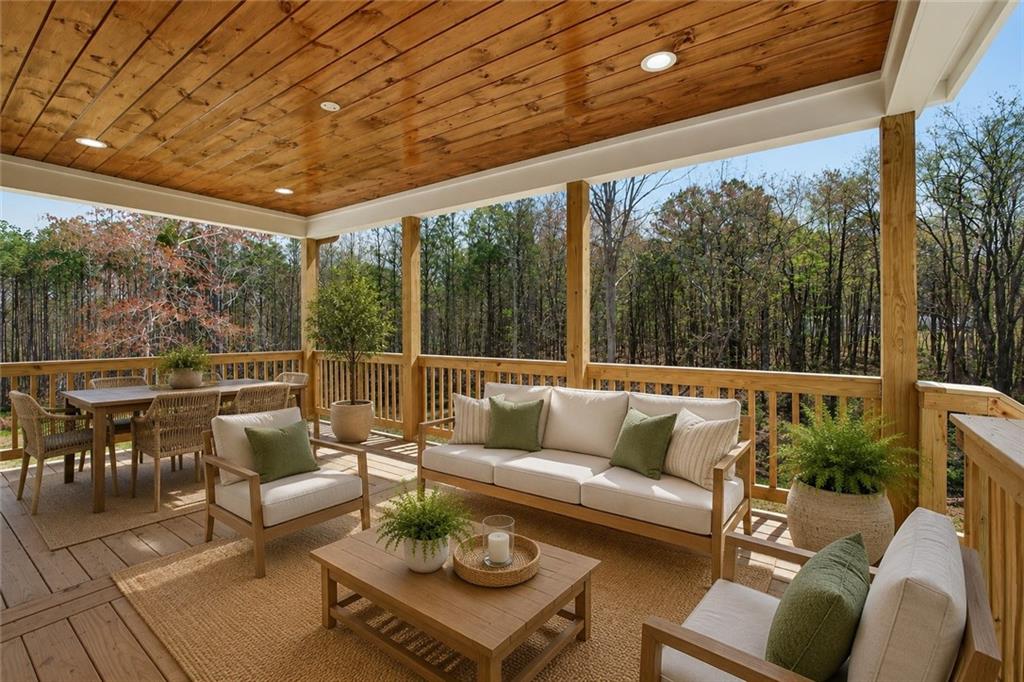 88 Carolyn Path Rockmart, GA 30153 - Photo 6 of 73 a balcony with furniture and a potted plant