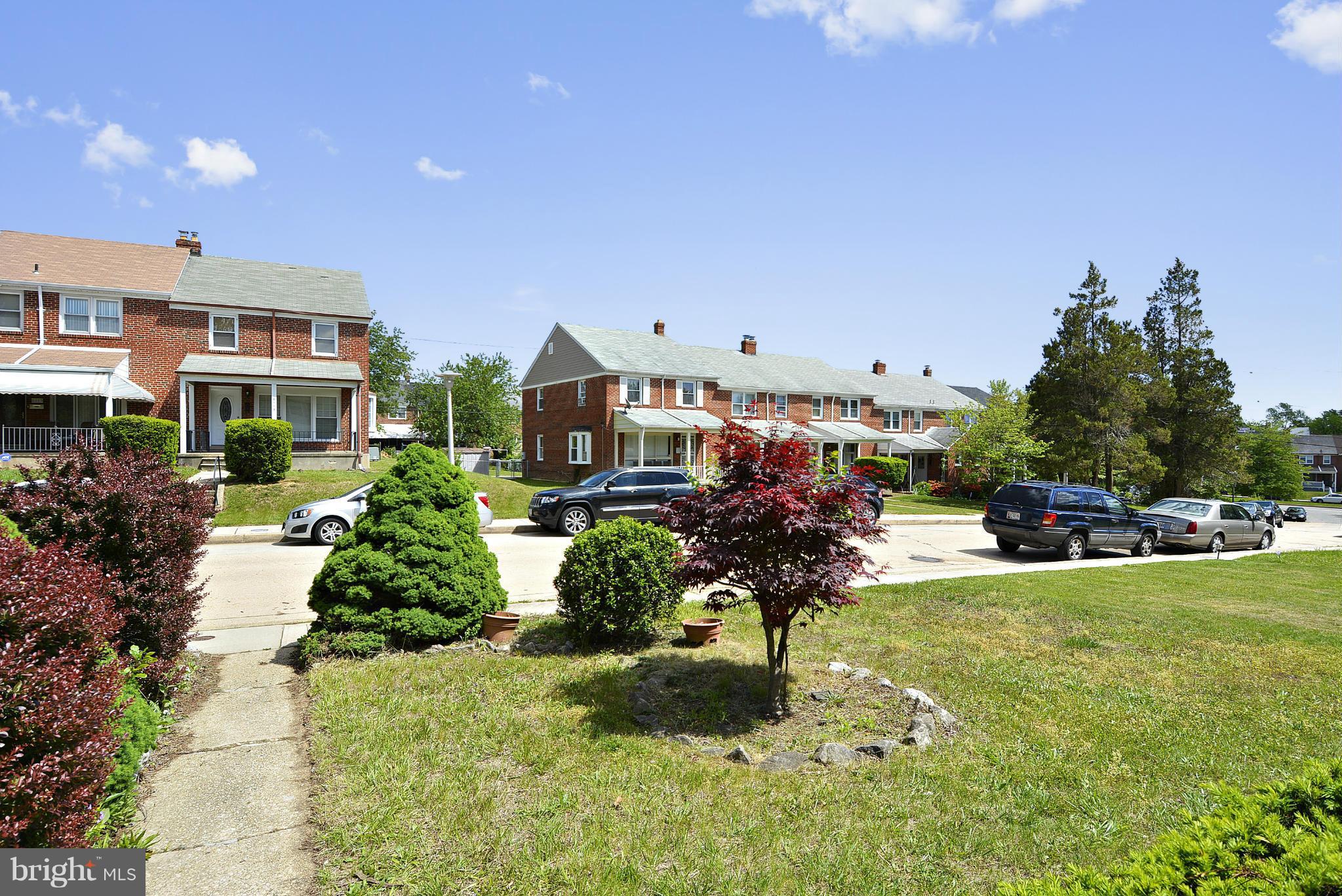 6116 Marlora Road Baltimore, MD 21239 - Photo 13 of 20 a view of a street with houses