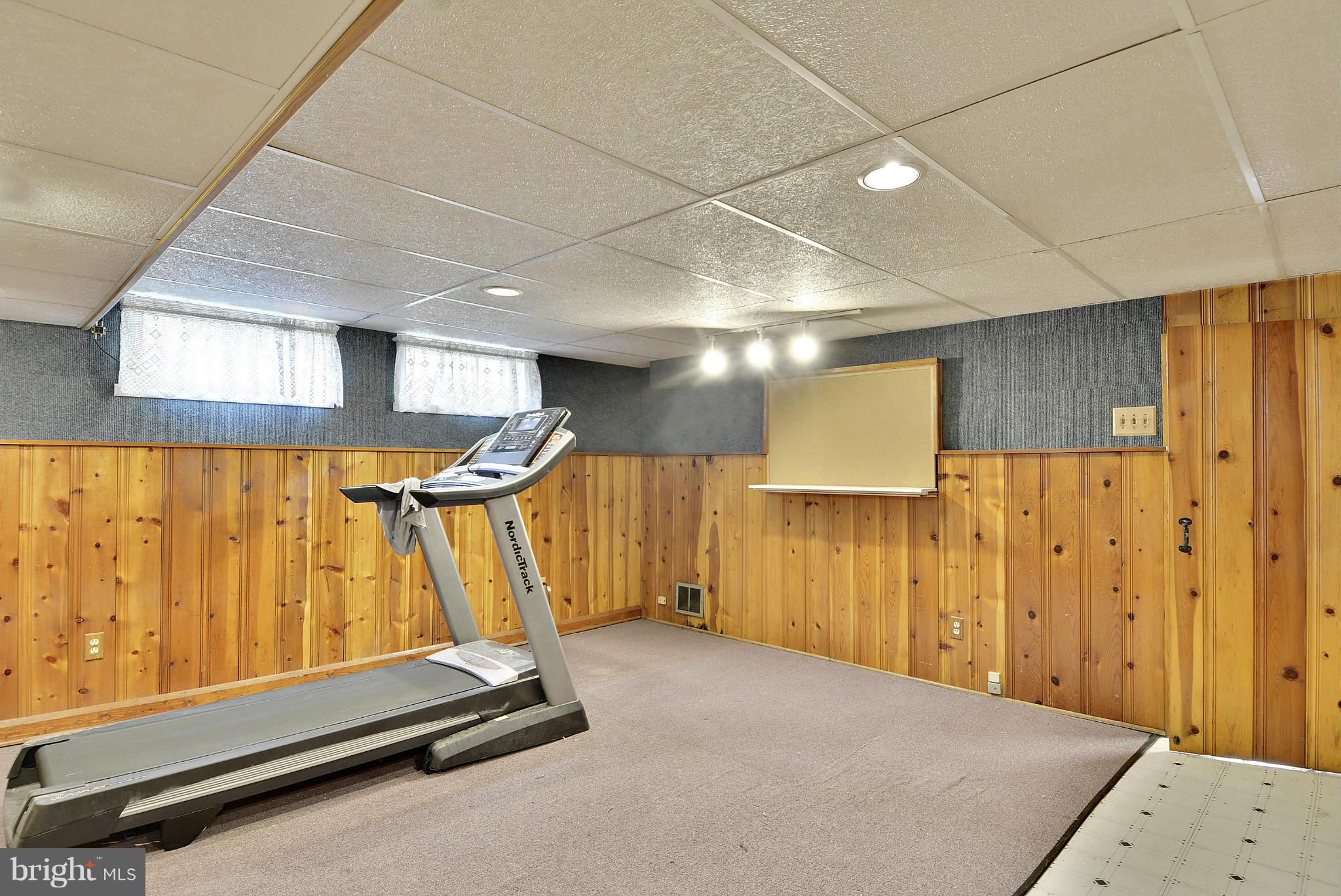 6116 Marlora Road Baltimore, MD 21239 - Photo 14 of 20 a view of a room with gym equipment