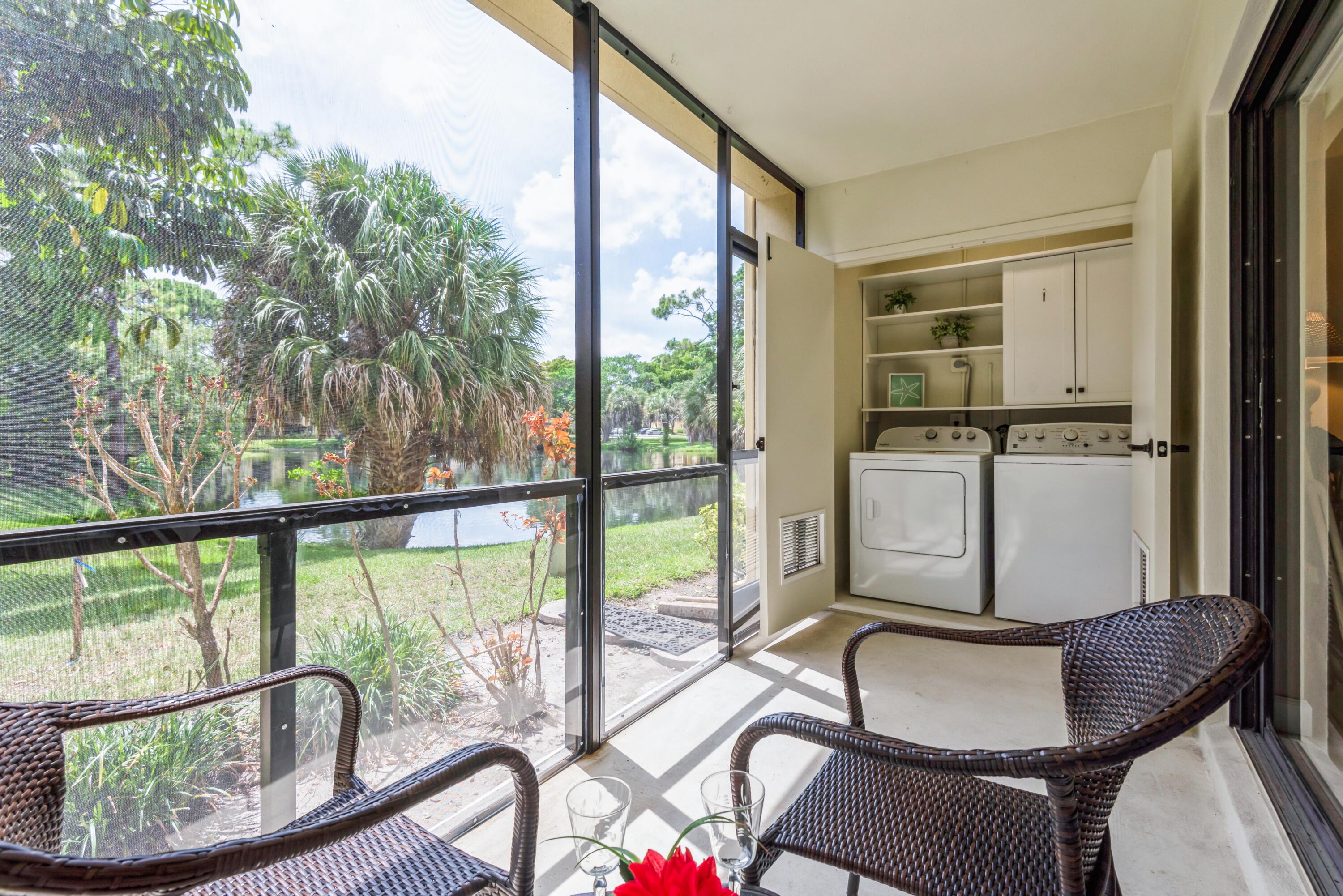 918 Southwest 9th St Circle, Unit 101 Boca Raton, FL 33486 - Photo 18 of 27 Laundry/Patio