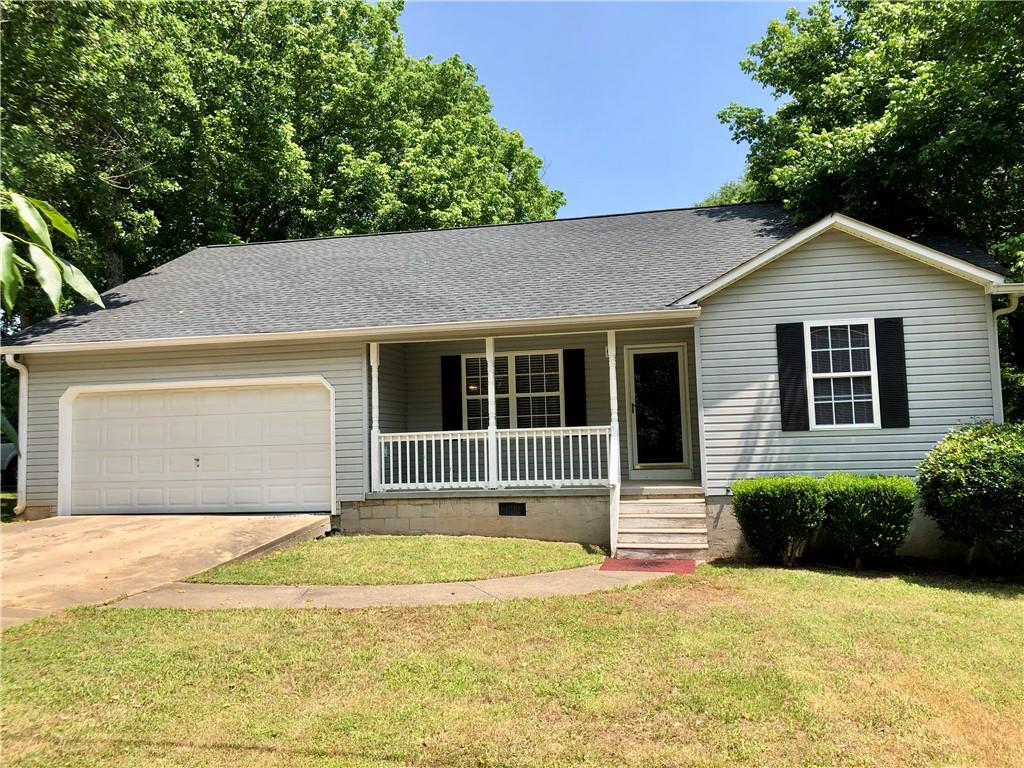 679 Fred Kelly Road Northeast Rome, GA 30161 - Photo 1 of 1 a house with trees in the background