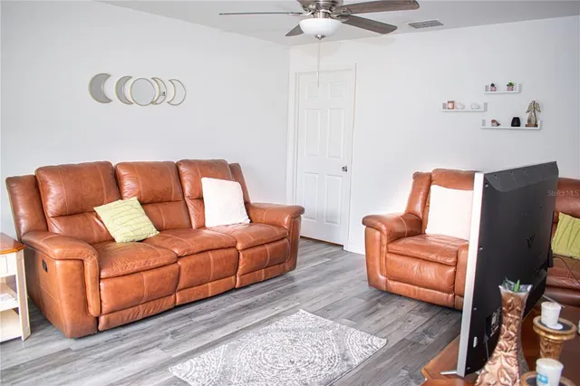 a living room with furniture and a couch