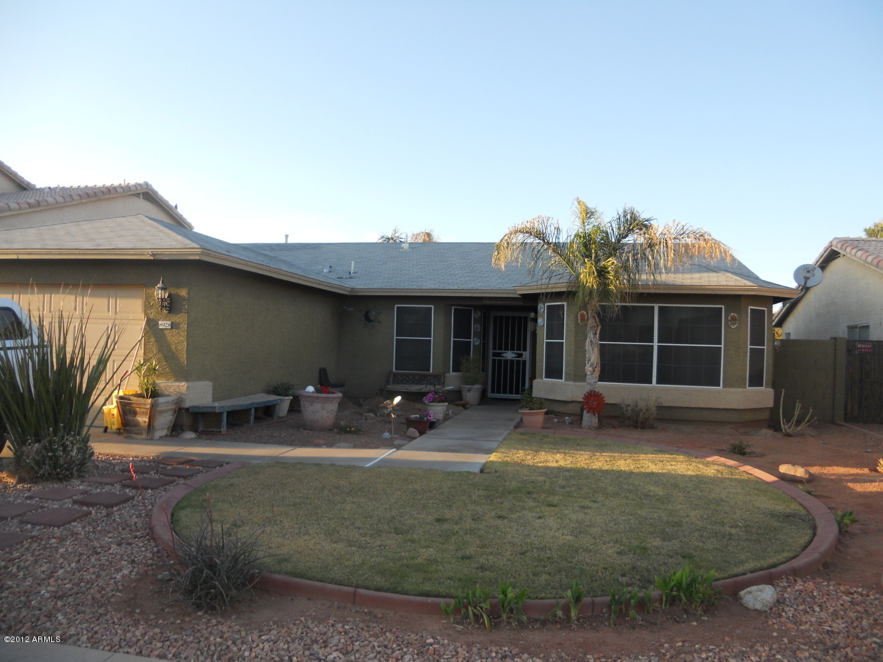 8928 West Monte Vista Road Phoenix, AZ 85037 - Photo 1 of 3 Front View 1