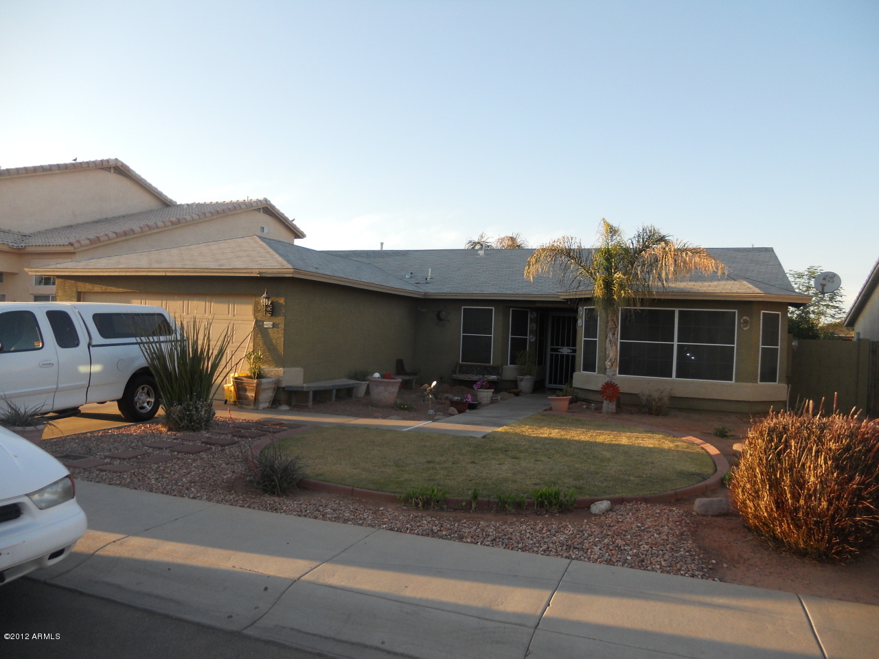8928 West Monte Vista Road Phoenix, AZ 85037 - Photo 2 of 3 front view