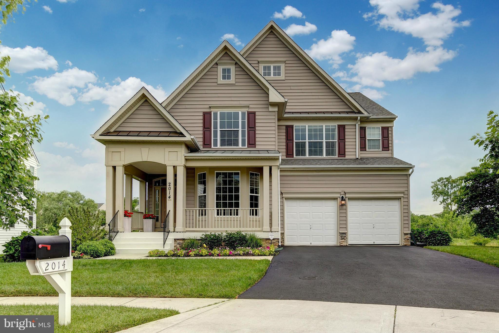2014 Myrtlewood Road Baltimore, MD 21209 - Photo 1 of 30 a front view of a house with a yard