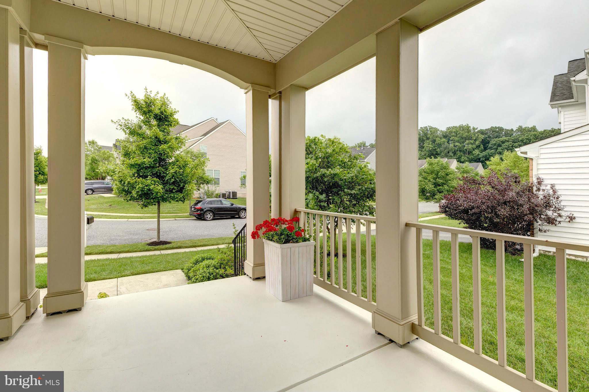 2014 Myrtlewood Road Baltimore, MD 21209 - Photo 3 of 30 a view of a porch with chairs and floor to ceiling window