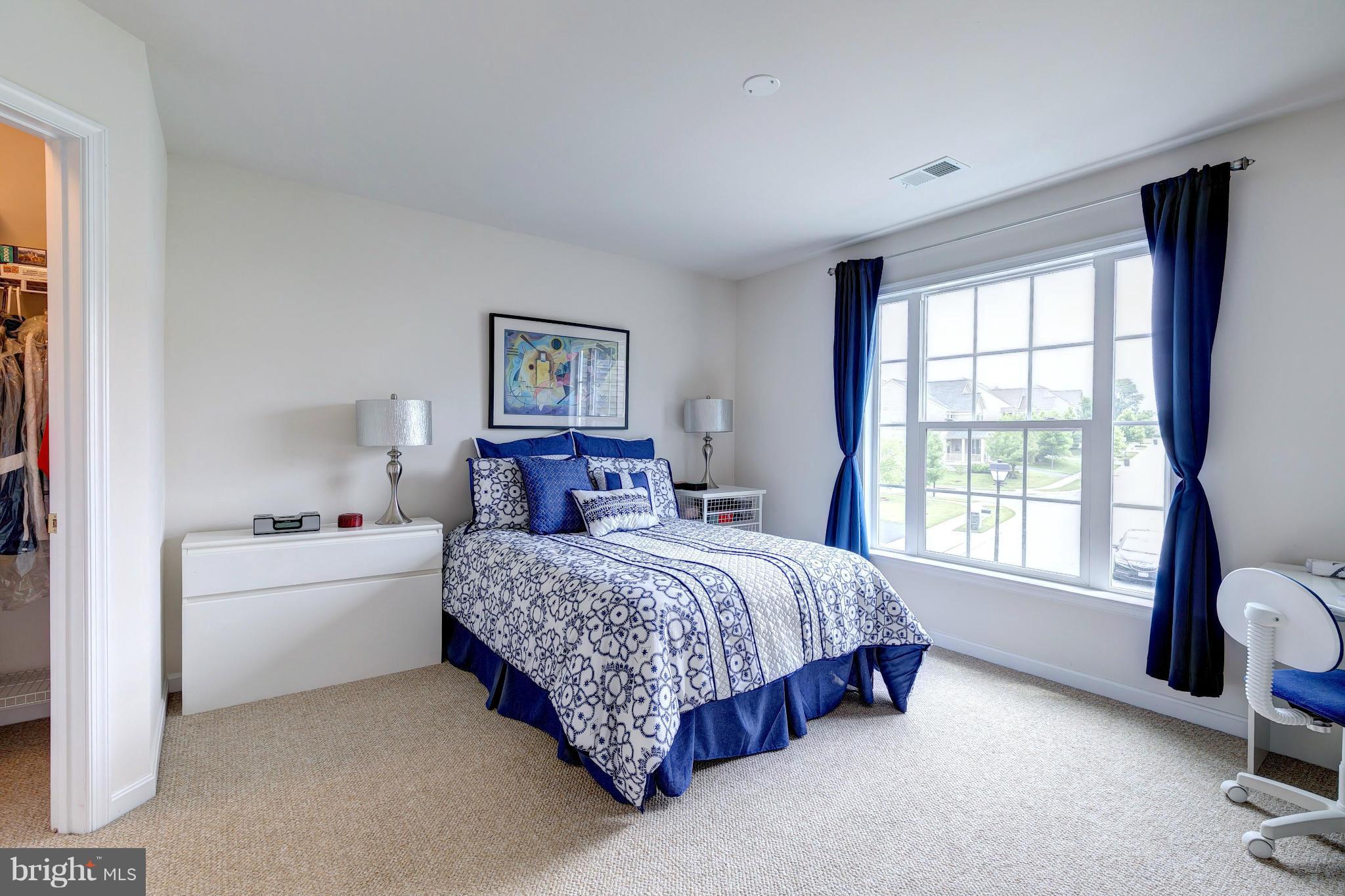 2014 Myrtlewood Road Baltimore, MD 21209 - Photo 23 of 30 a bedroom with a bed and a window