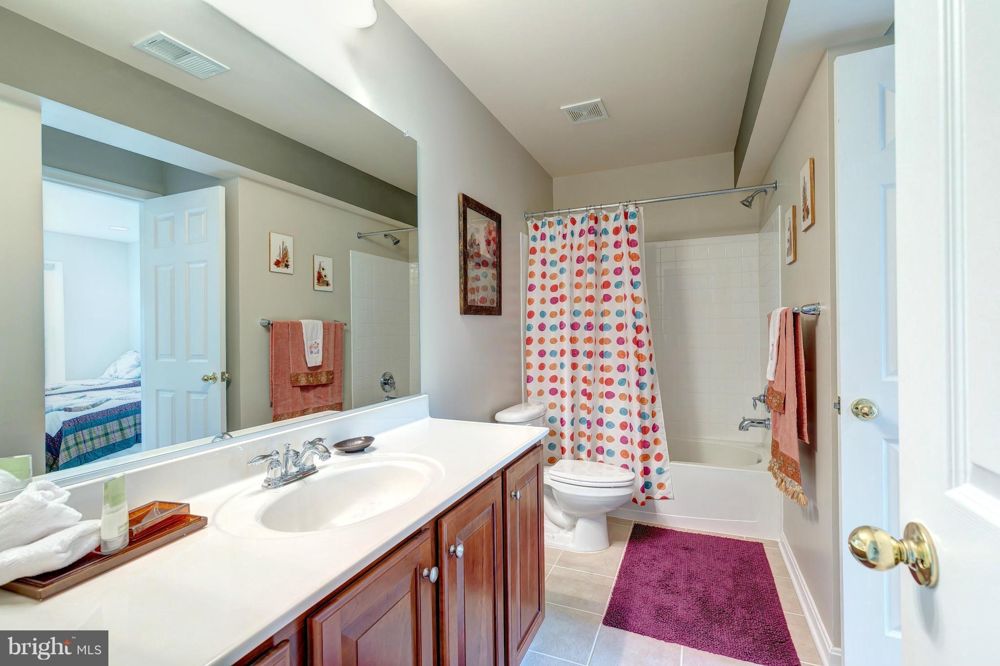 2014 Myrtlewood Road Baltimore, MD 21209 - Photo 28 of 30 a bathroom with a sink toilet and shower