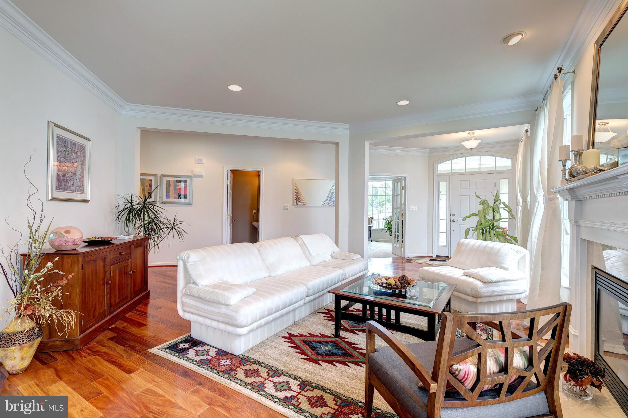 2014 Myrtlewood Road Baltimore, MD 21209 - Photo 6 of 30 a living room with furniture a table and a large window