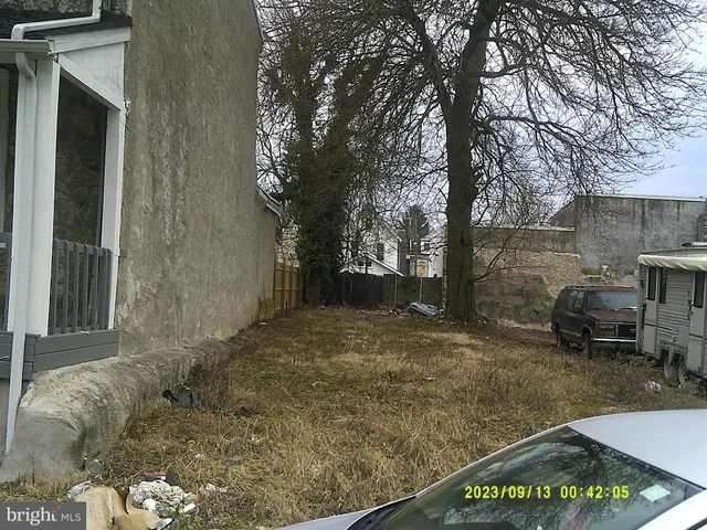 a view of a yard with an outdoor space