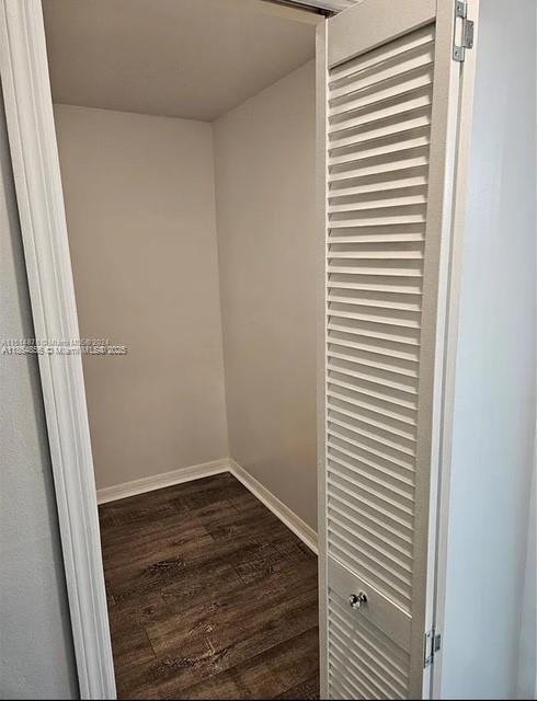14763 Southwest 152nd Place Miami, FL 33196 - Photo 11 of 30 a view of a room with wooden floor