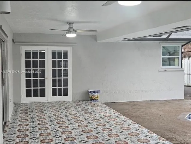 a view of a backyard with pathway