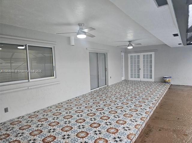 14763 Southwest 152nd Place Miami, FL 33196 - Photo 21 of 30 a bedroom with a bed and a window