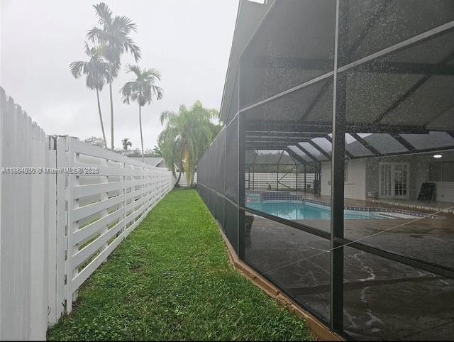 14763 Southwest 152nd Place Miami, FL 33196 - Photo 23 of 30 a view of a backyard with pathway