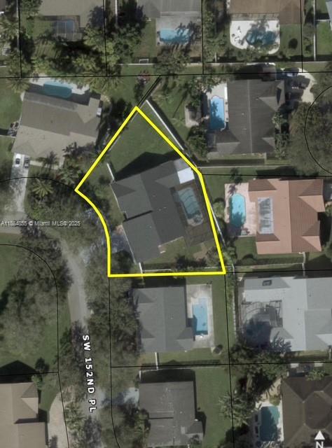 14763 Southwest 152nd Place Miami, FL 33196 - Photo 30 of 30 an aerial view of a house with a yard